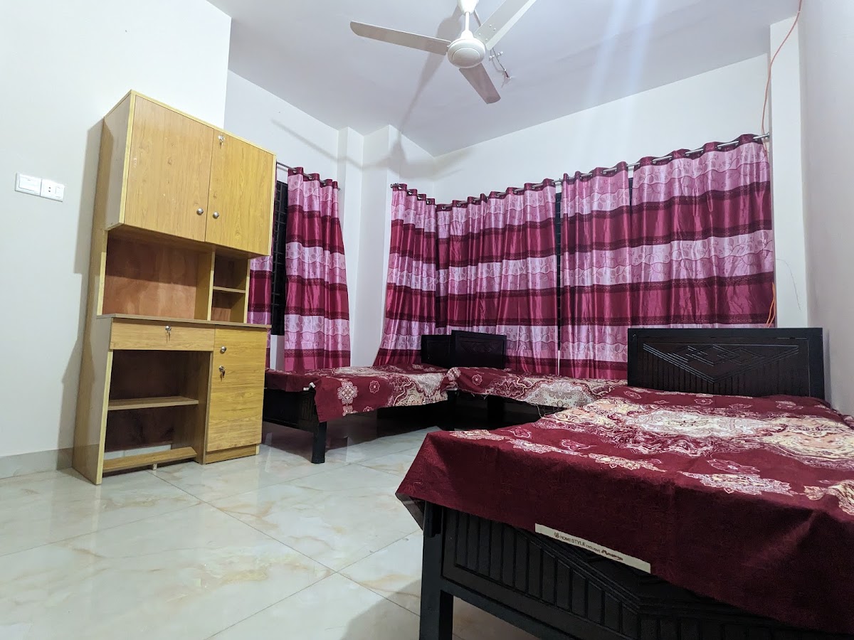 University Boys' Hostel logo